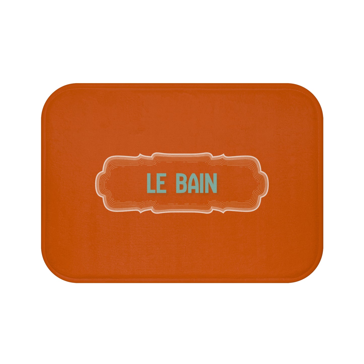 Orange bath mat with 'LE BAIN' text on a white background