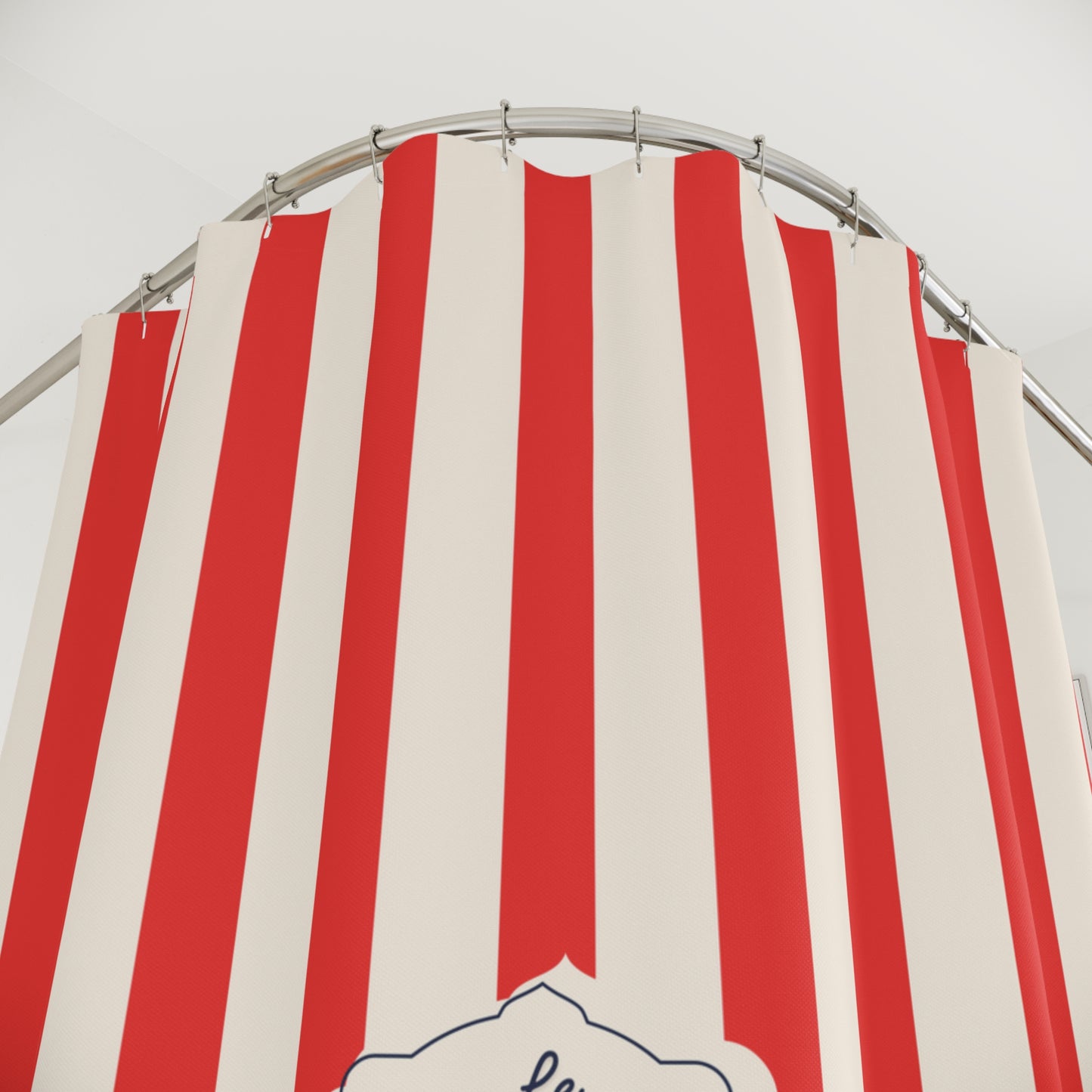 Red and white striped canopy with a circular metal frame against a light gray background