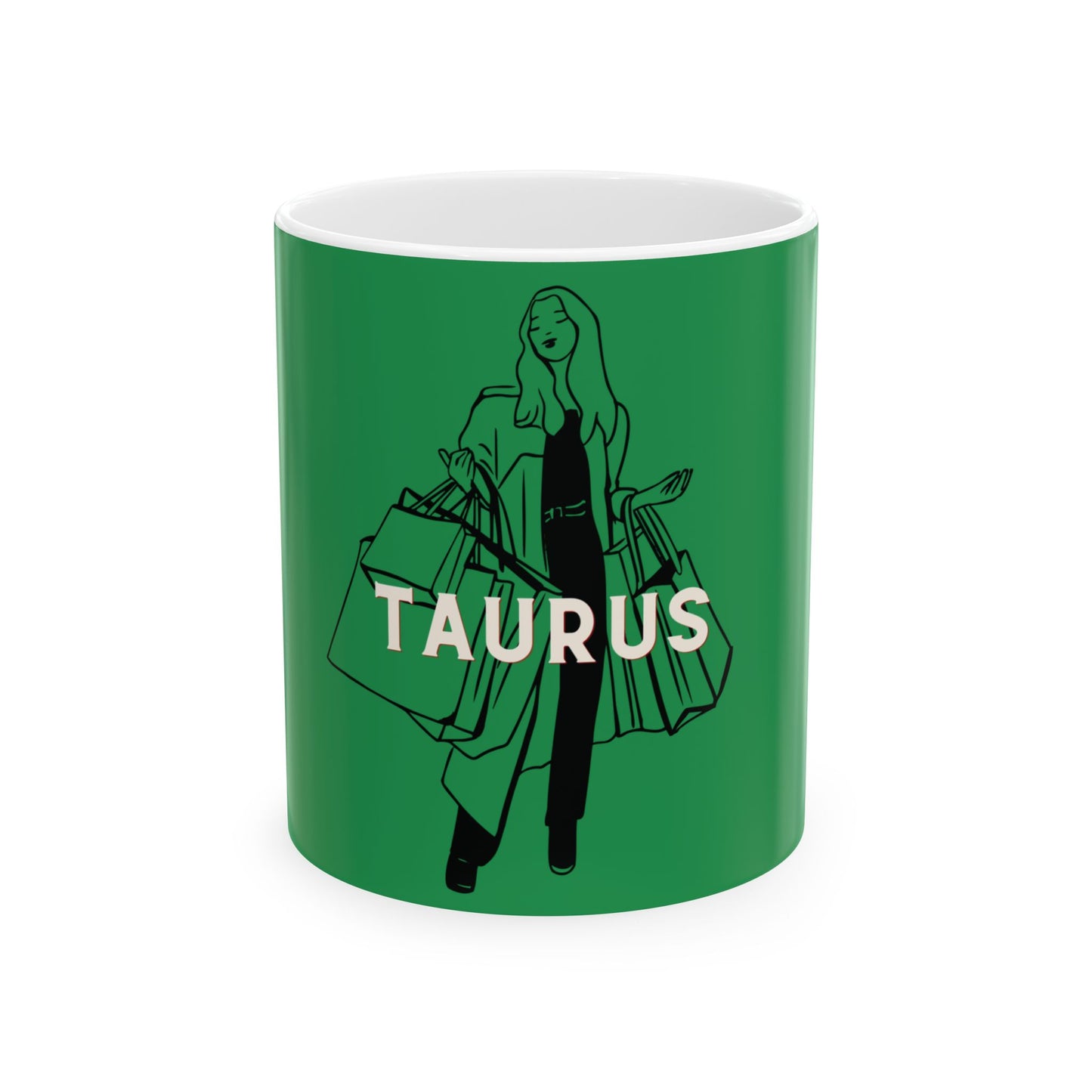 Green mug with a black and white illustration of a woman holding bags and the word 'TAURUS' on a white background