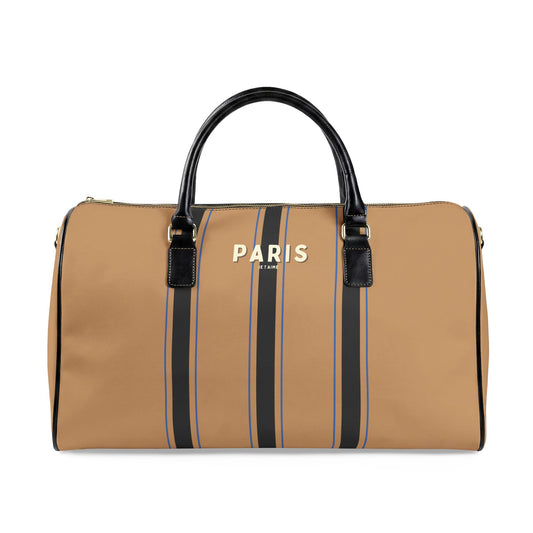 Tan duffel bag with black straps and 'PARIS' branding on a white background