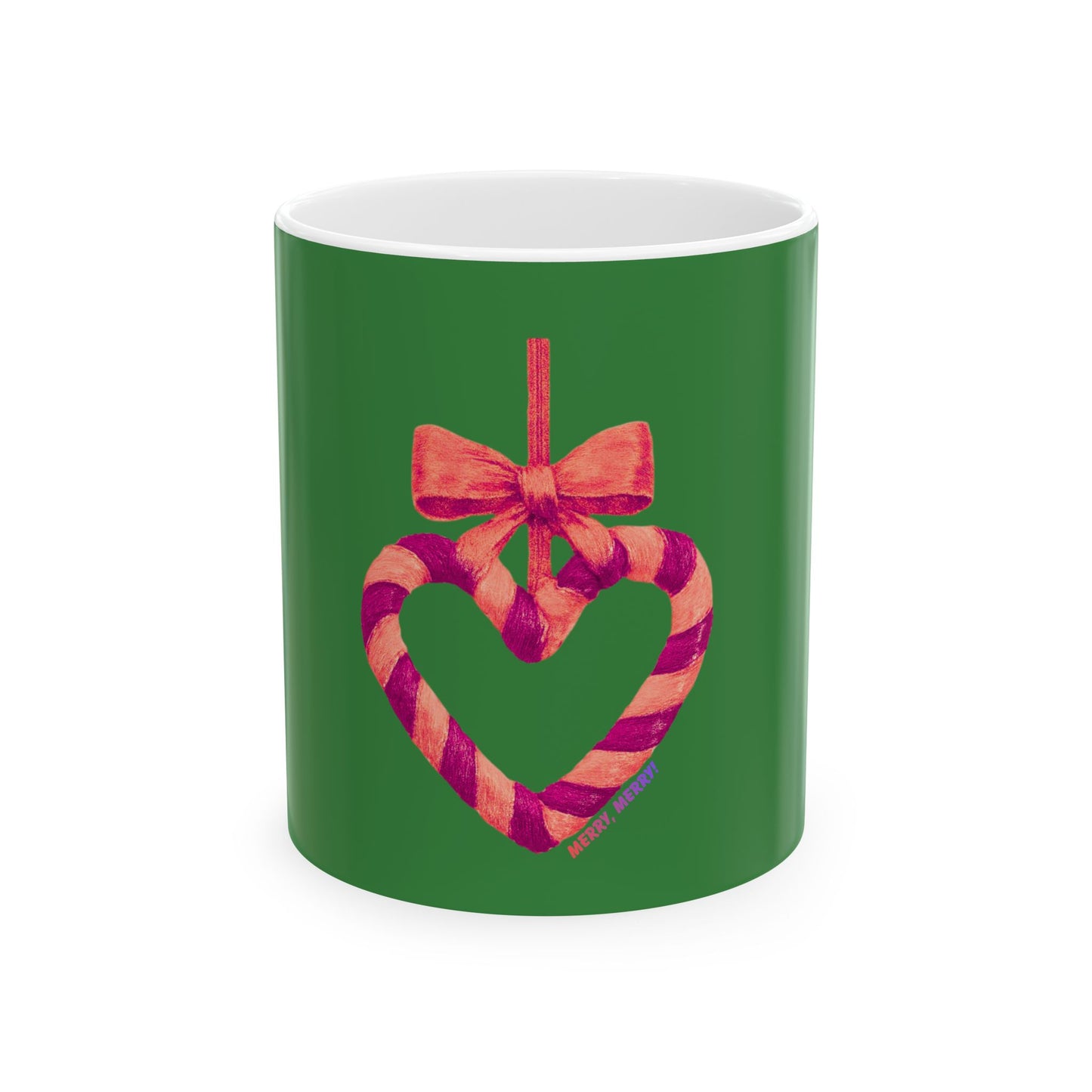 Green mug with a heart-shaped candy cane and bow design on a white background