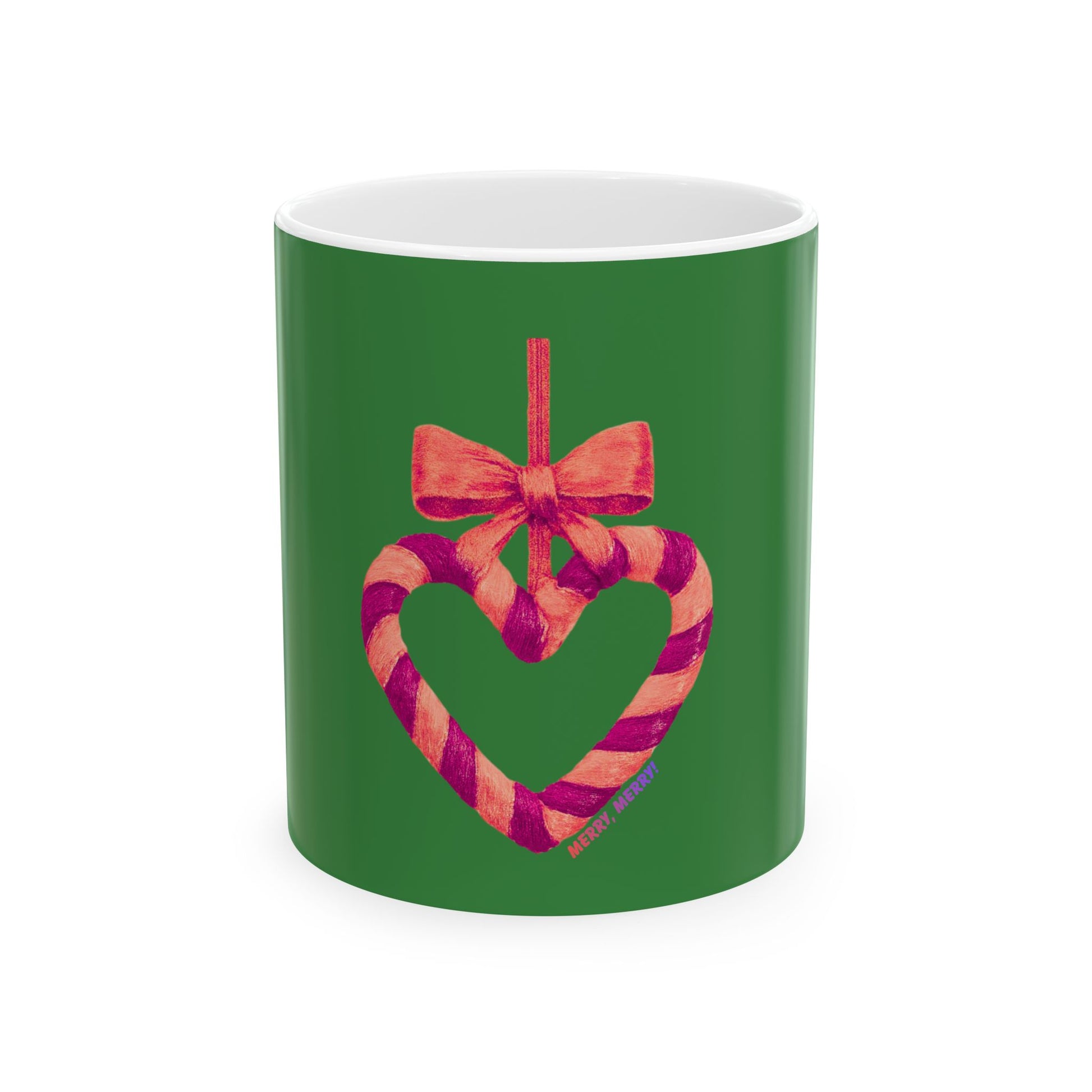 Green mug with a heart-shaped candy cane and bow design on a white background