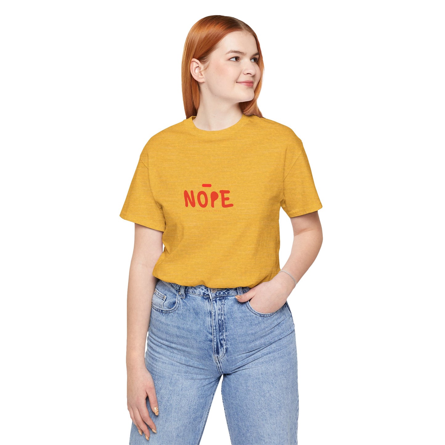 Person wearing a yellow t-shirt with 'NOPE' text on a white background
