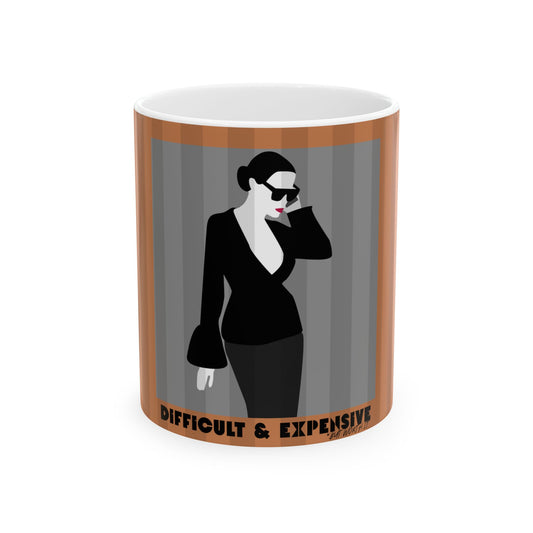 A white ceramic mug featuring a minimalist graphic of a woman in a black outfit and sunglasses against gray vertical stripes, framed by brown borders, with the text 'DIFFICULT & EXPENSIVE' printed at the bottom.