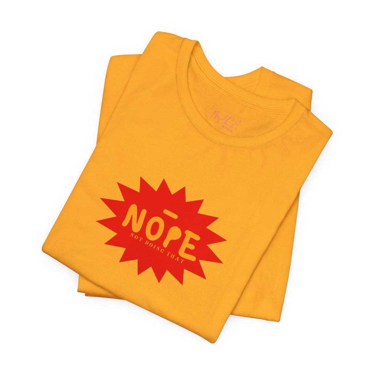 A folded yellow t-shirt with a red starburst graphic on the front that reads 'NOPE NOT GOING TO BE' in yellow, shown on a plain white background.