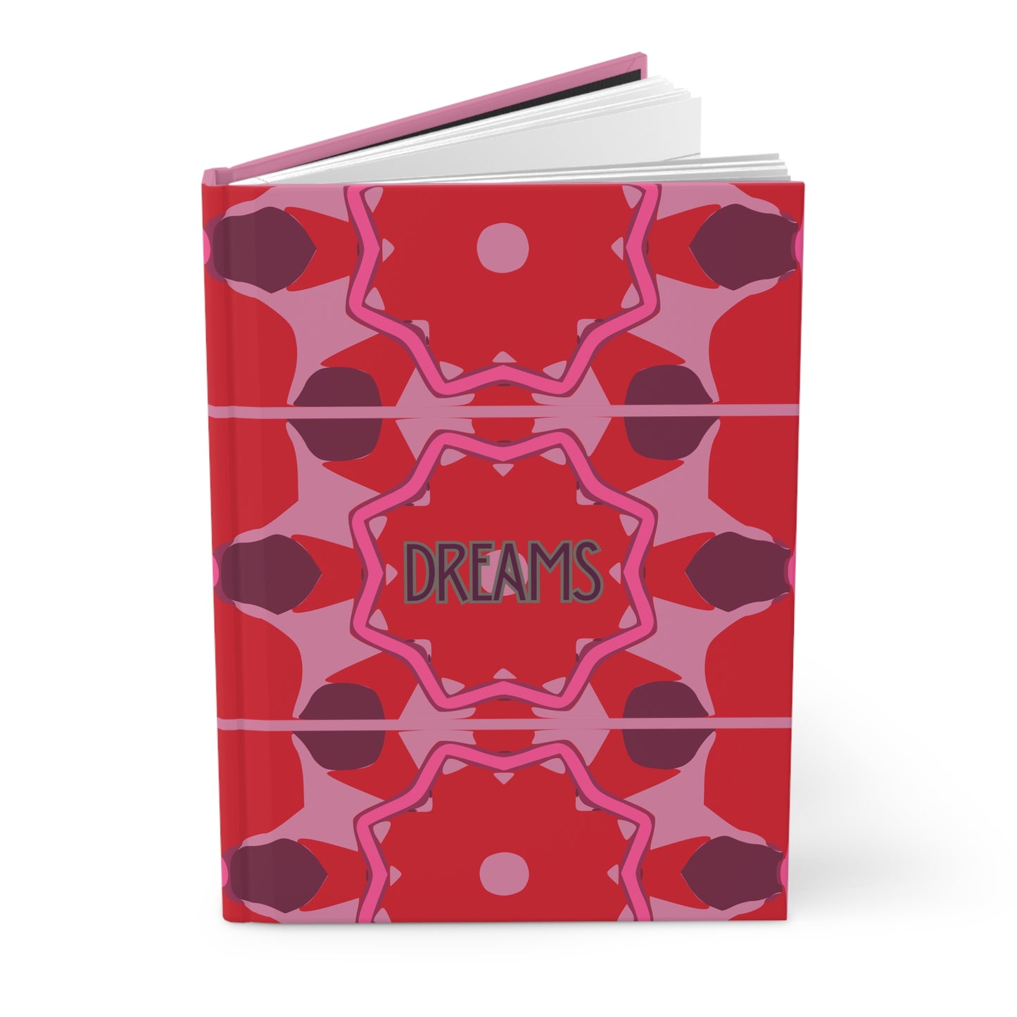 Notebook with red and pink geometric design on cover, featuring the word 'DREAMS'.