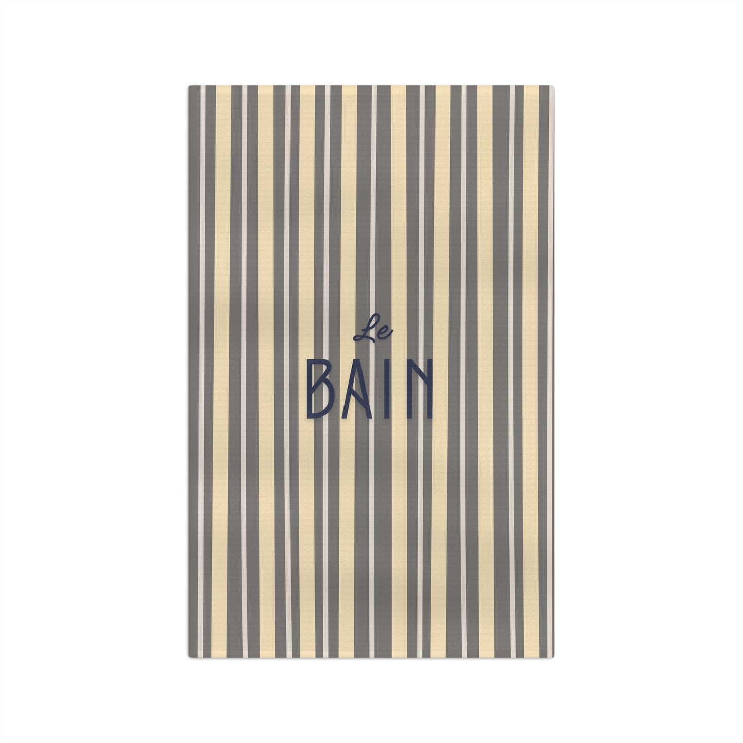 Striped towel with 'Le Bain' text on a white background
