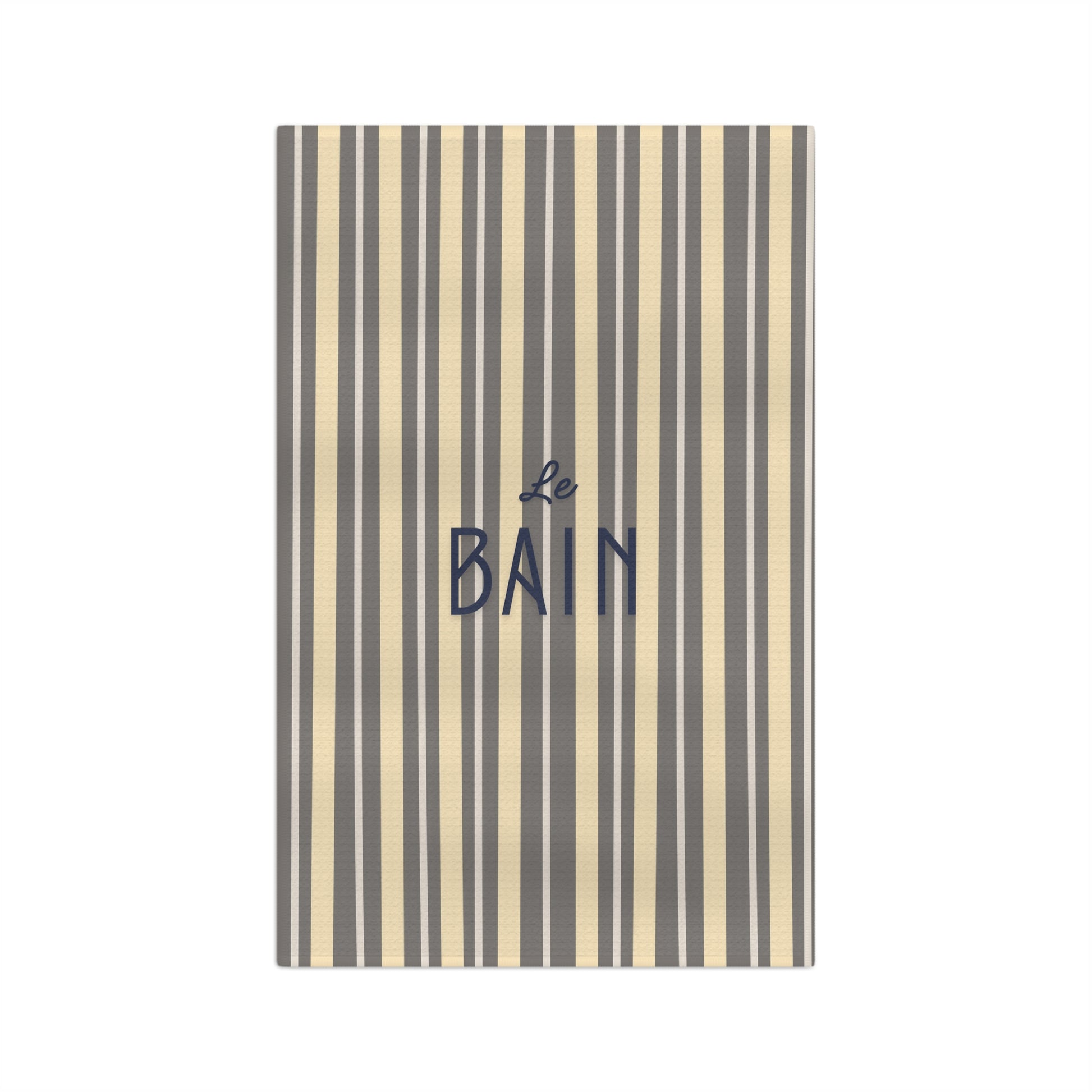 Striped towel with 'Le Bain' text on a white background