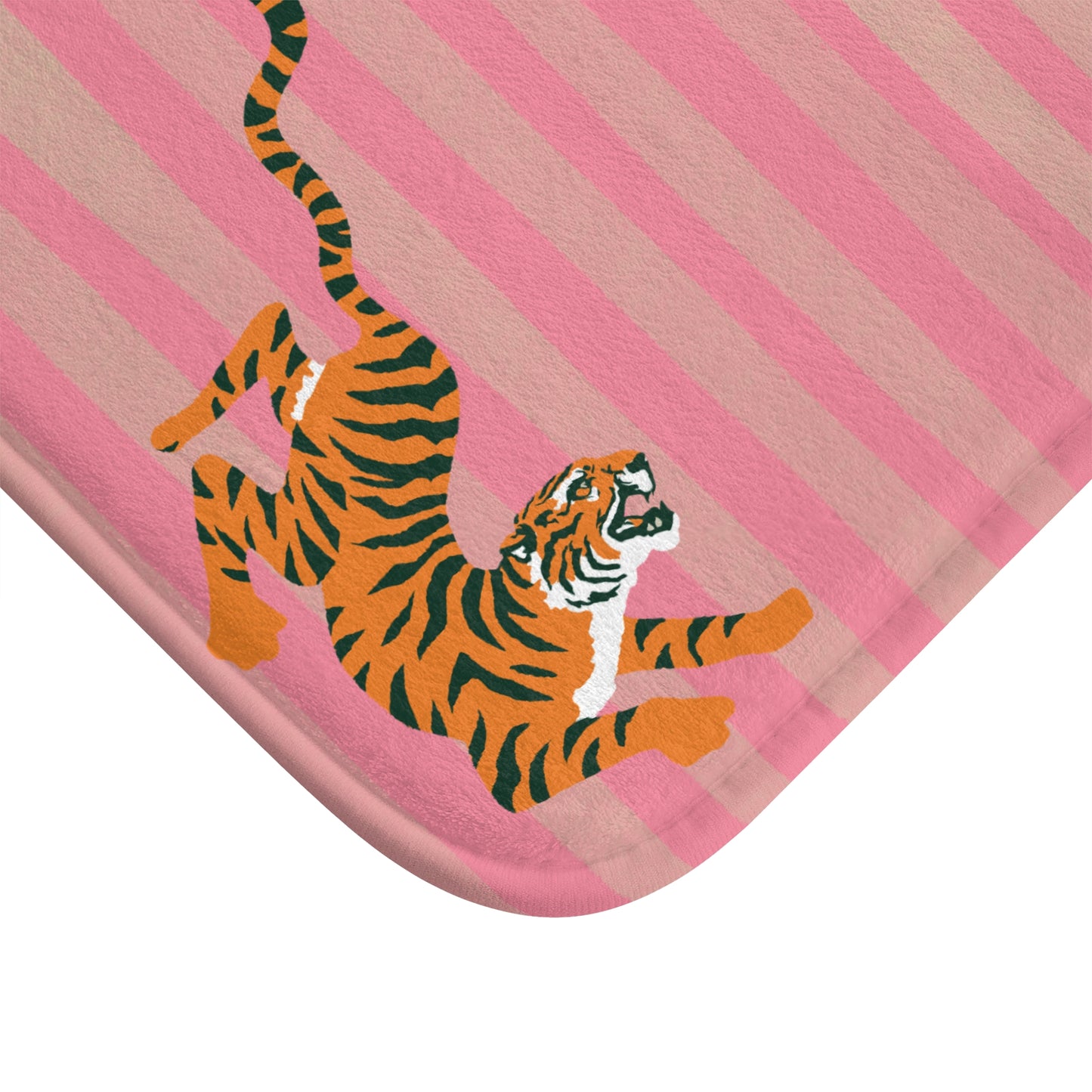 Pink baby blanket with a tiger design on a white background