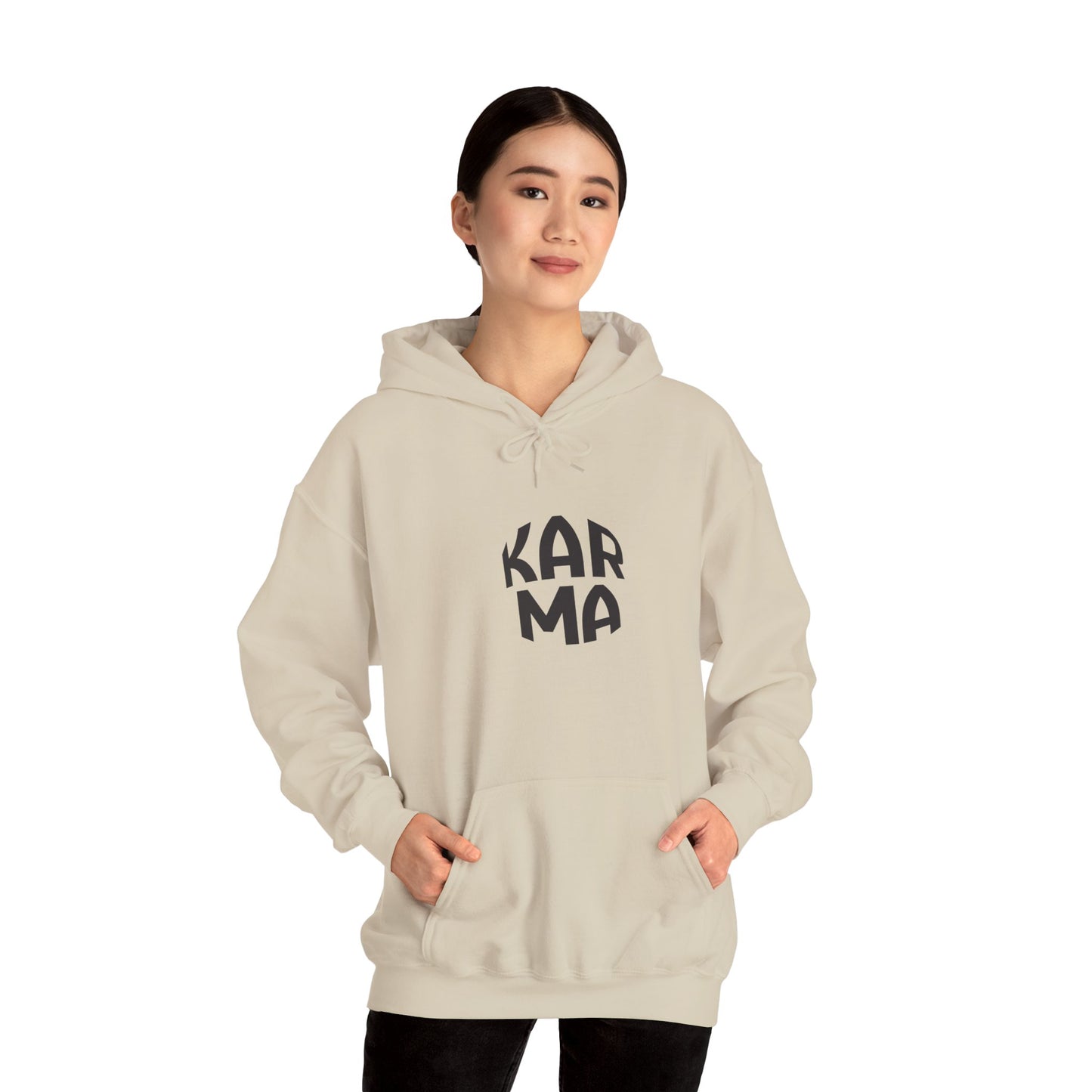 Person wearing a beige hoodie with a graphic design on a white background