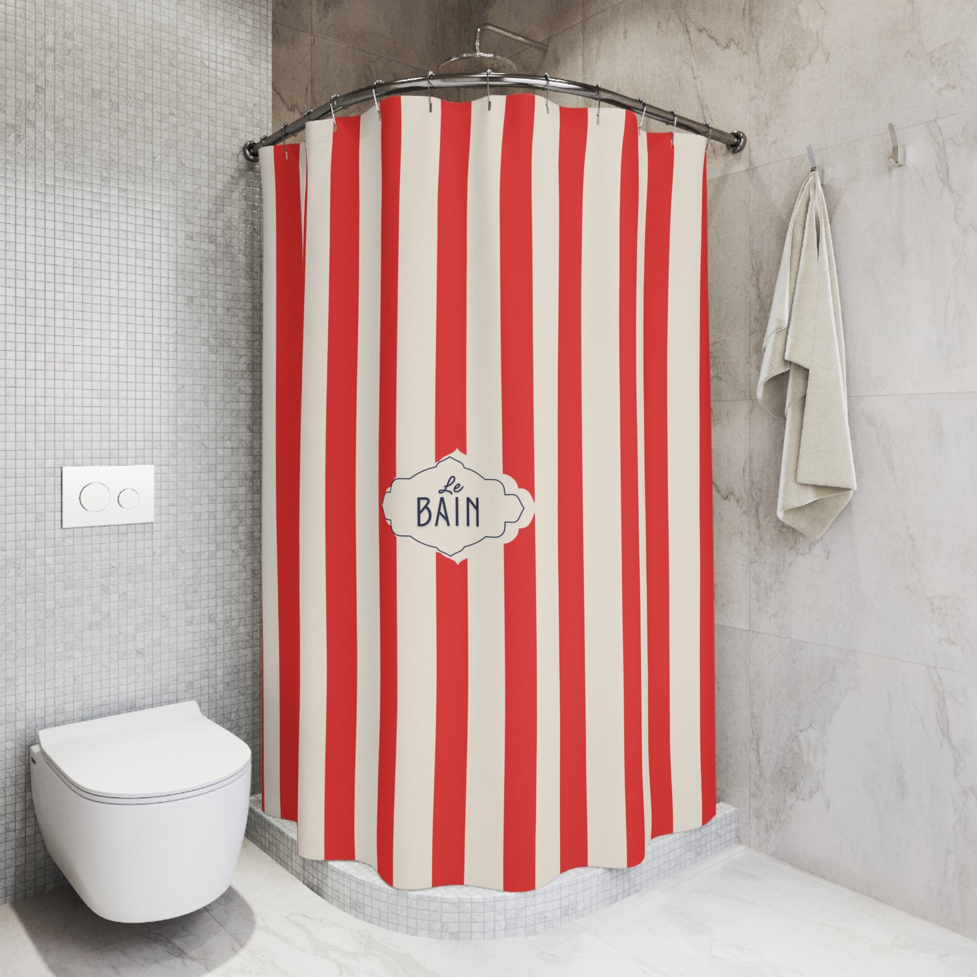 Red and white striped shower curtain with 'La Bébé Bain' text in a bathroom.