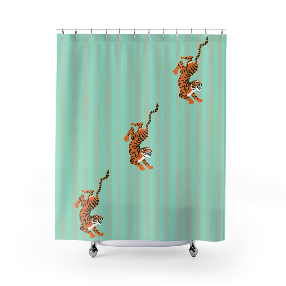 A mint green shower curtain with vertical stripes and three orange and black tiger illustrations, shown hanging from silver hooks on a white background.