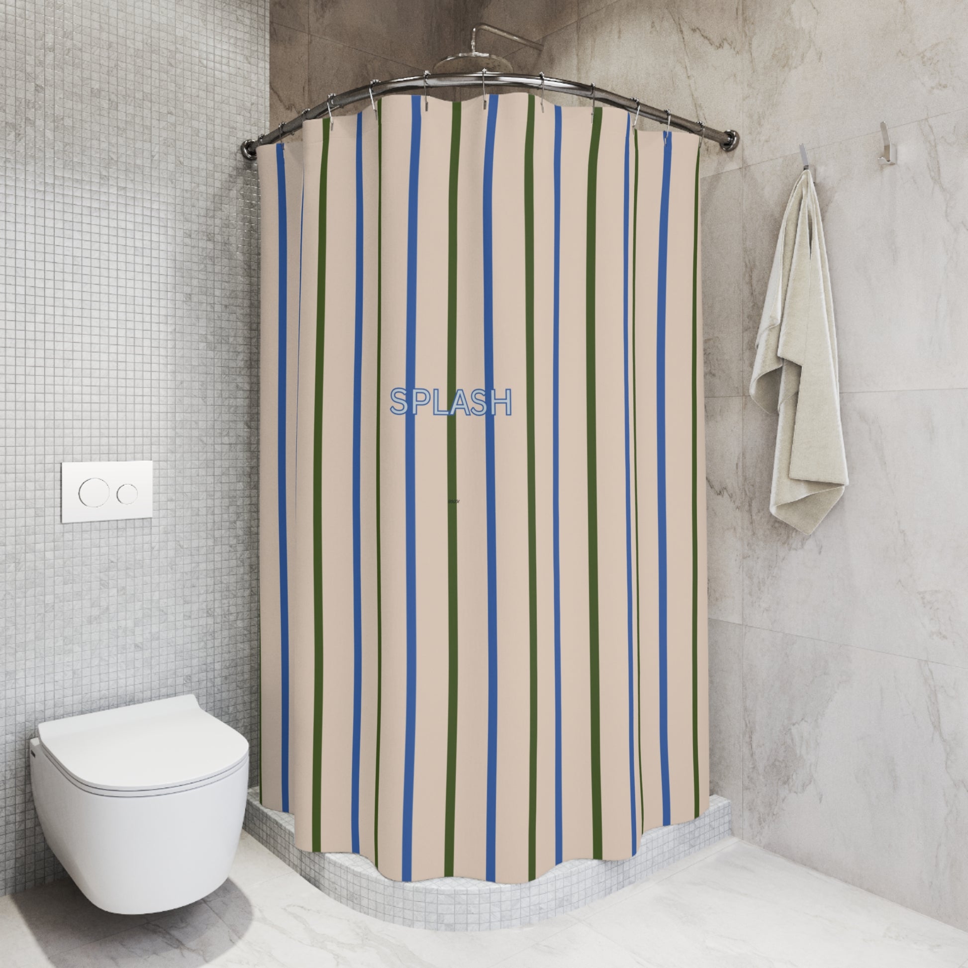Striped shower curtain in a bathroom with a toilet and towel.
