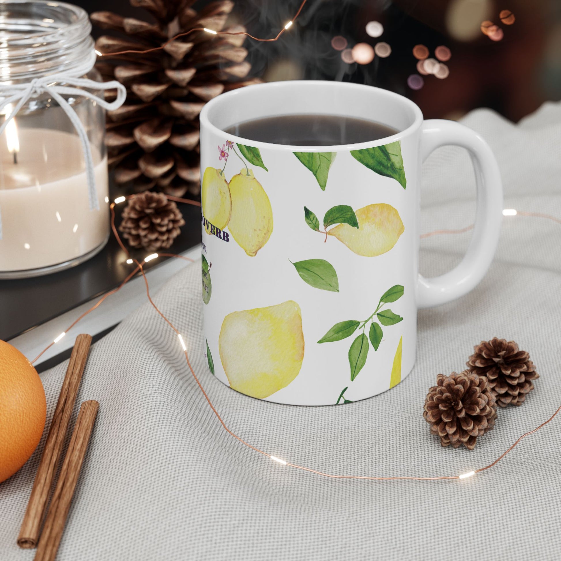 Mug with lemon design on a table with decorative items