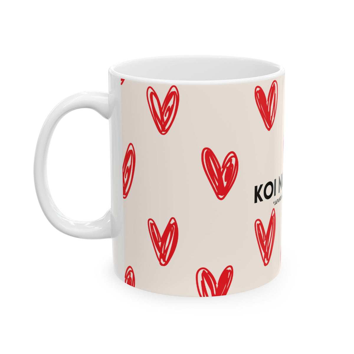 A white ceramic mug with a beige printed background, decorated with a pattern of red hand-drawn hearts and partial black text on the side.