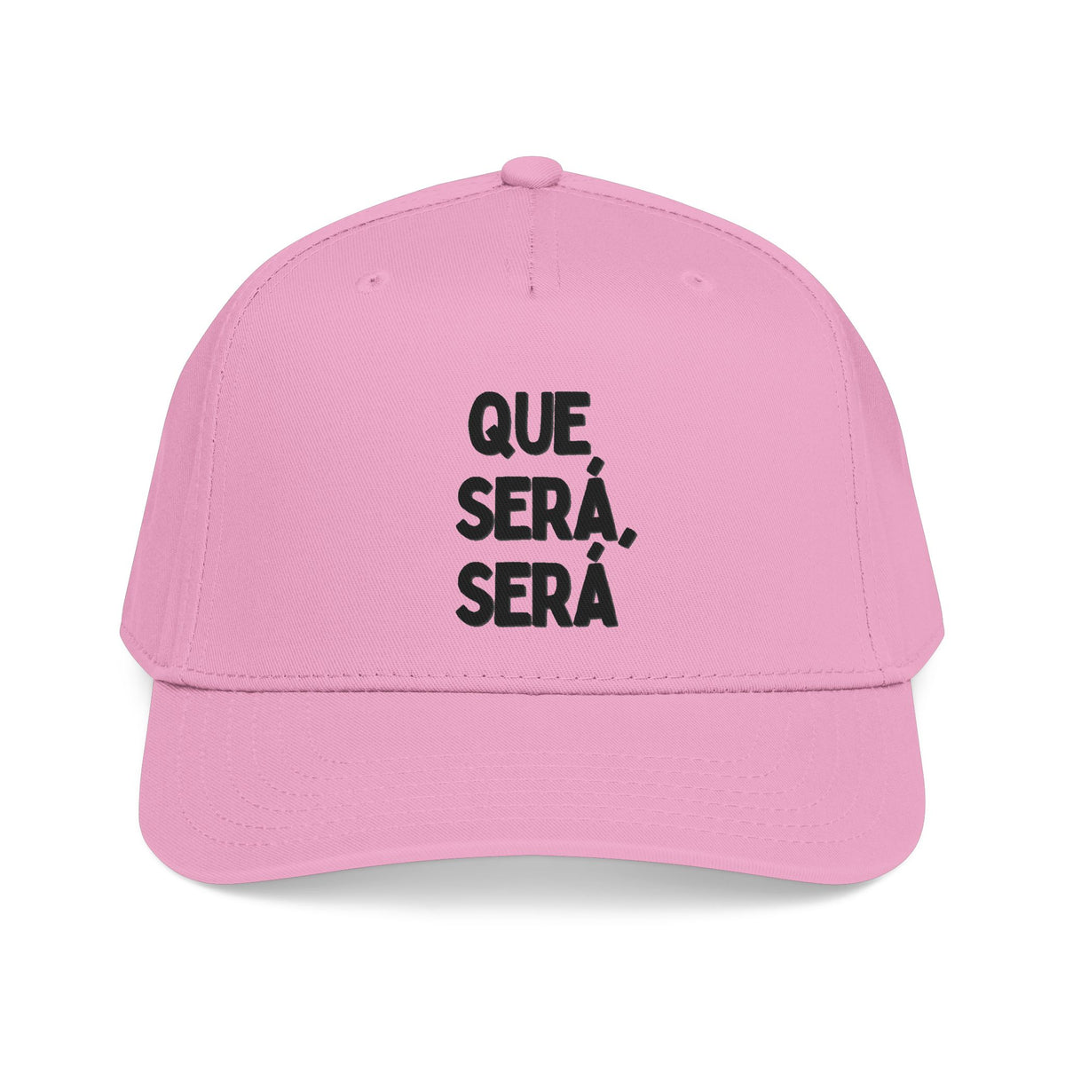 A pink baseball cap with black text on the front reading 'QUE SERÁ, SERÁ' in a bold serif font, shown against a plain white background.