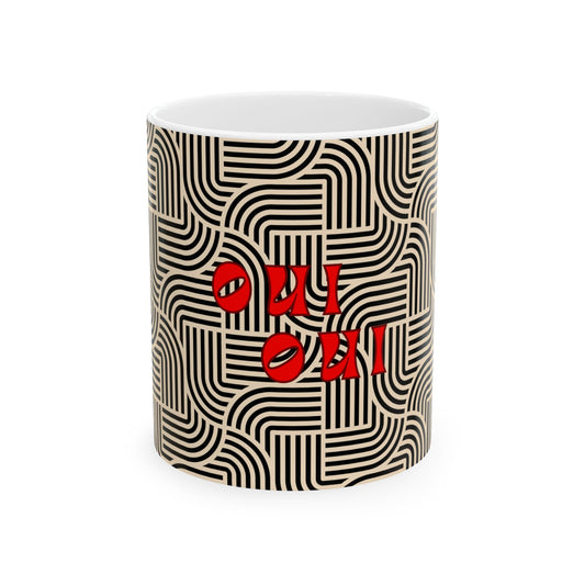 Ceramic mug with black wavy pattern and red text 'oui oui' on a white background