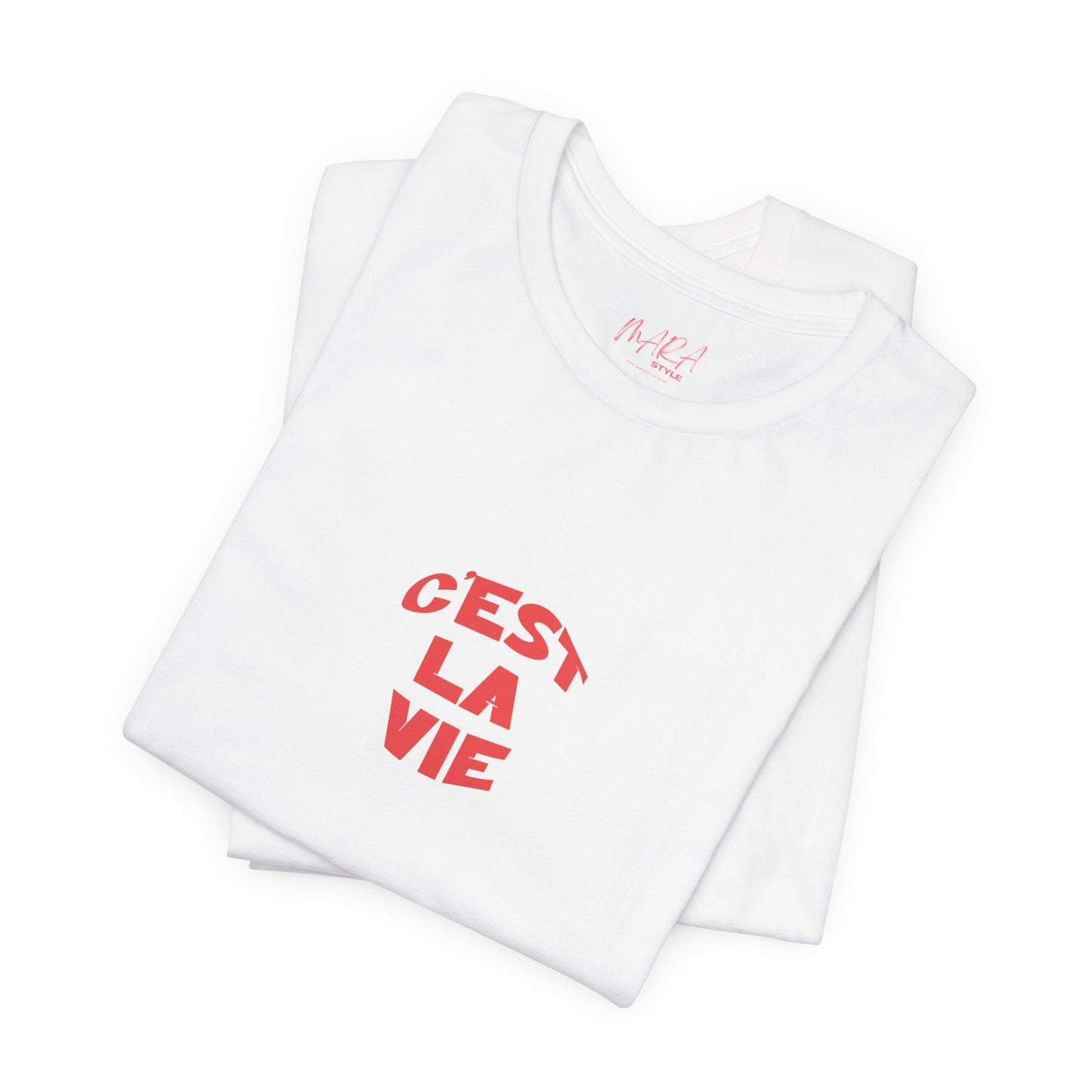 White t-shirt with red text 'Cést La Vie' on a white background