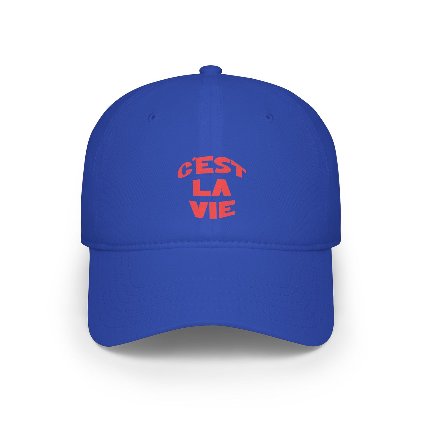 Blue cap with red text 'Cést La Vie' on a white background