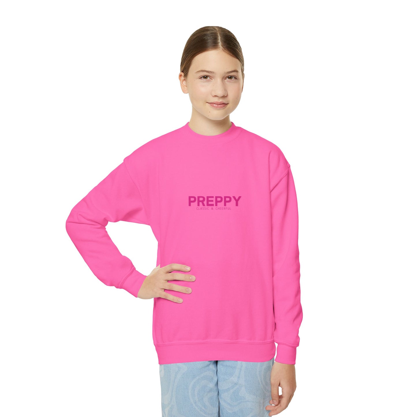 Teen wearing a pink sweatshirt with 'PREPPY' text on a white background