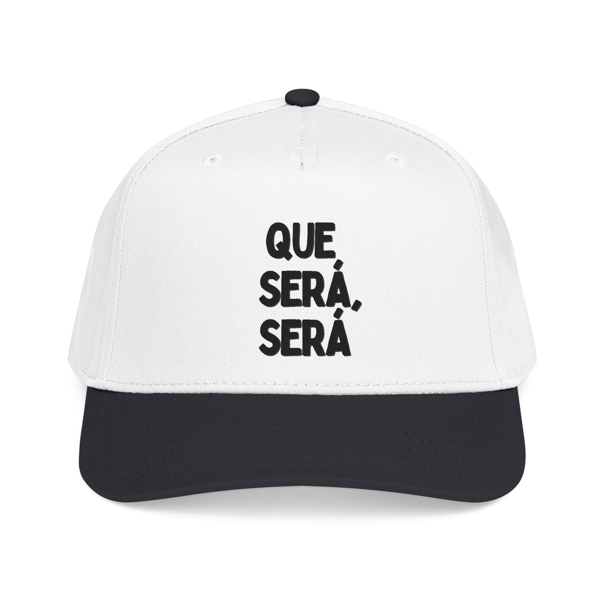 A white and black baseball cap with the Spanish text 'QUE SERÁ, SERÁ' printed in black on the front panel, shown against a plain white background.