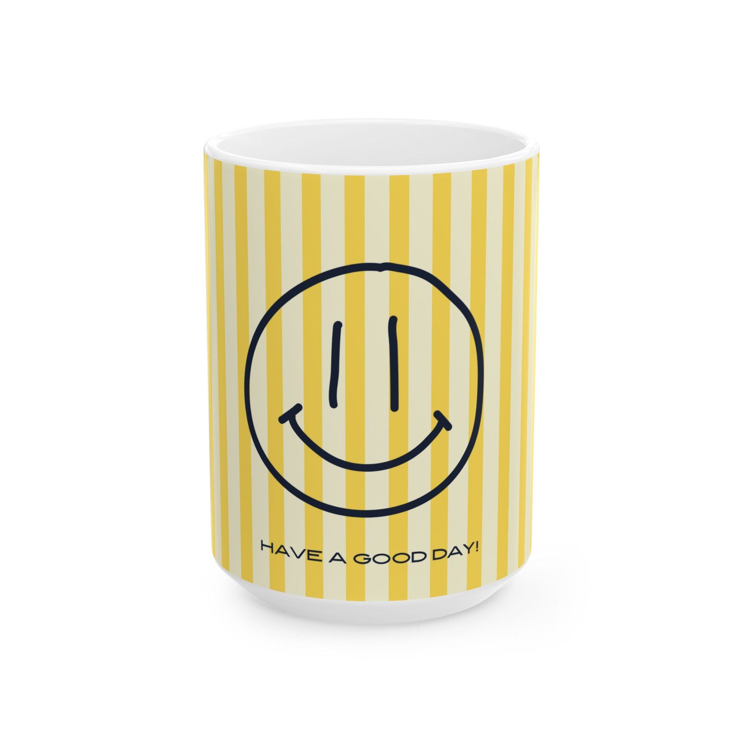 A white ceramic mug with a yellow and cream vertical stripe pattern, featuring a black minimalist smiley face and the text 'HAVE A GOOD DAY!' printed near the bottom.