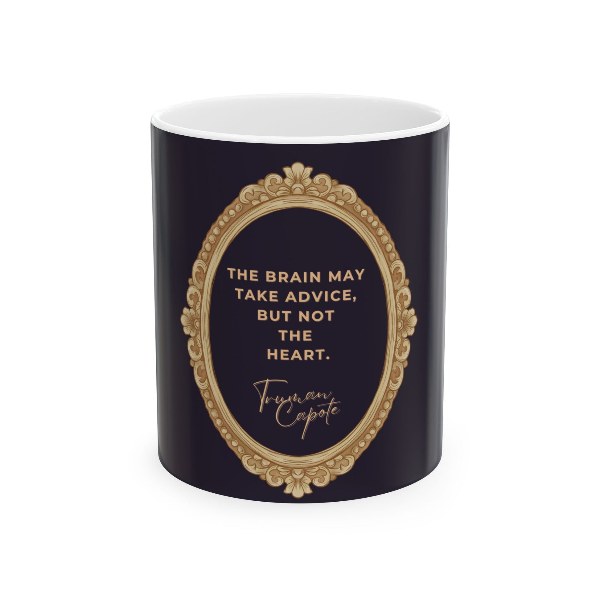 Navy mug with gold decorative frame and white interior, featuring a quote by Truman Capote.
