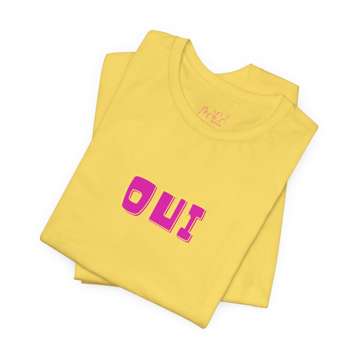 Yellow t-shirt with 'OUI' in pink on a white background