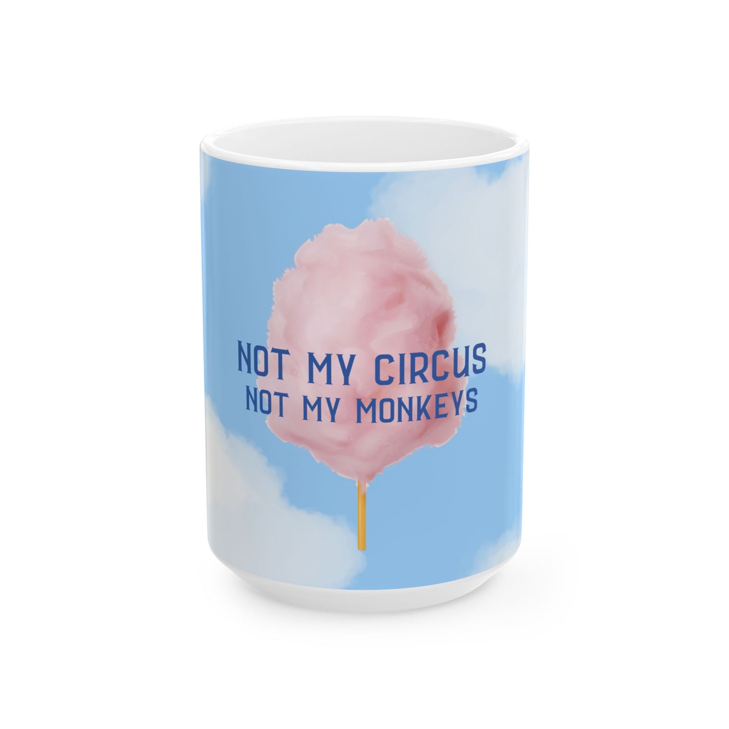 A white ceramic mug featuring a light blue wrap-around print with a pink cotton candy graphic and the text 'NOT MY CIRCUS NOT MY MONKEYS' in dark blue, shown on a white background.