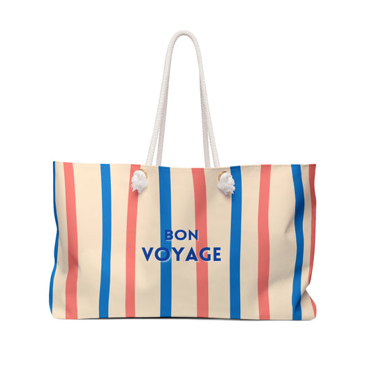 Striped beach bag with 'Bon Voyage' text on a white background