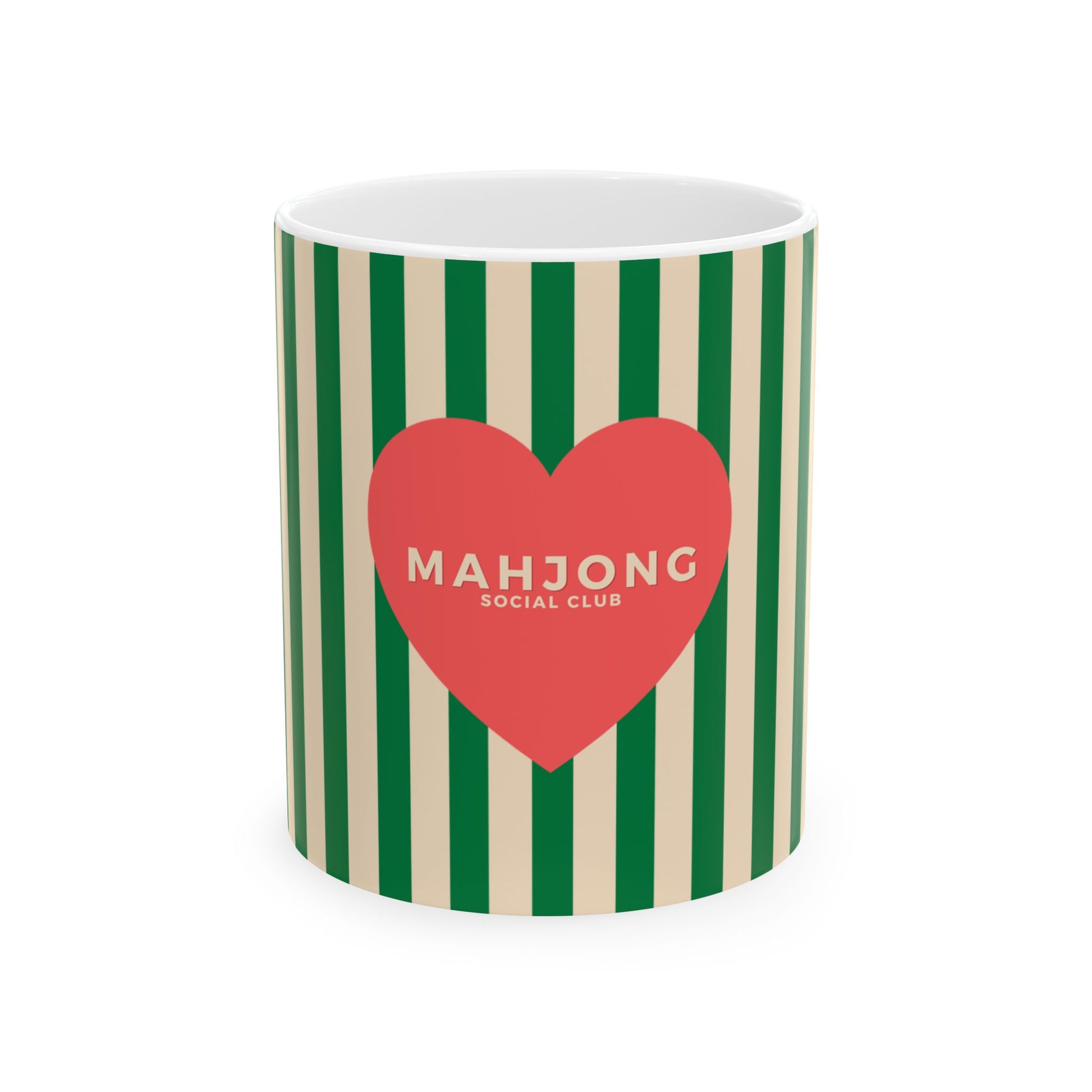 A white ceramic mug featuring a green and beige vertical stripe pattern, with a large red heart in the center containing the text 'MAHJONG SOCIAL CLUB' in beige.