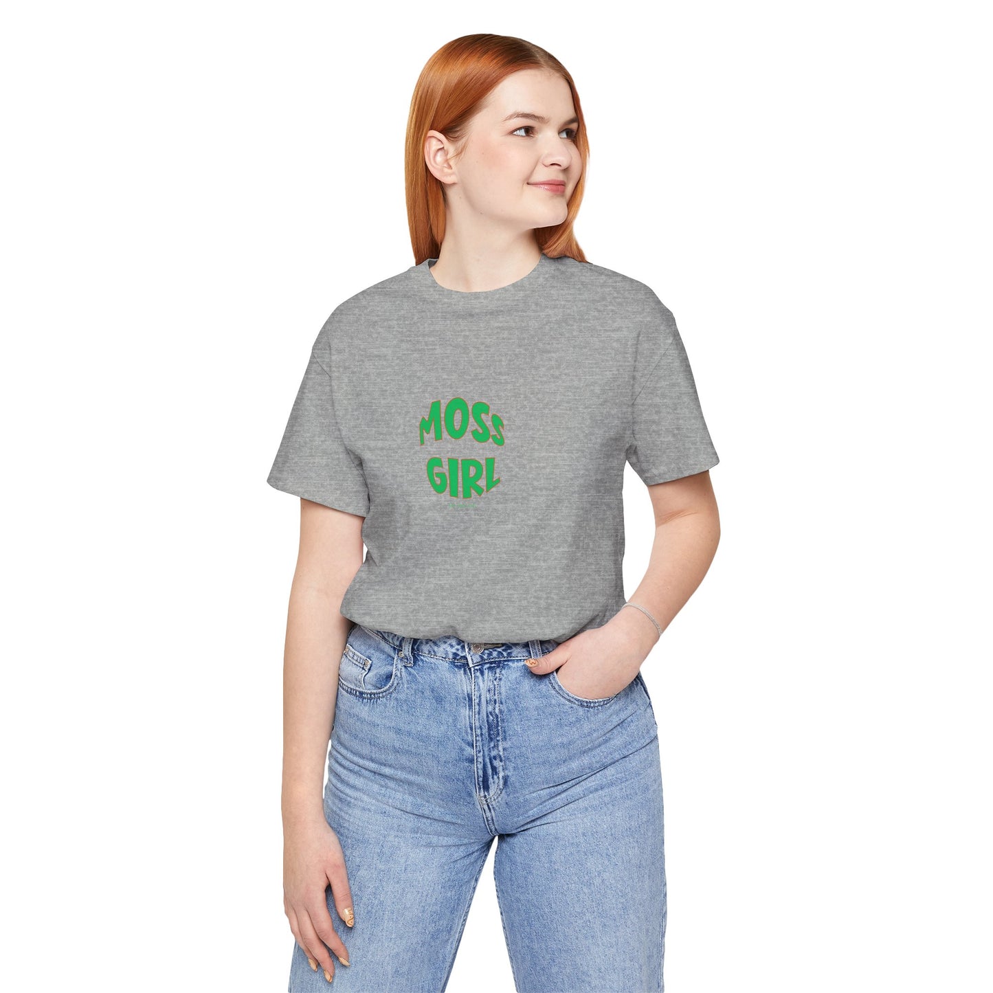 Person wearing a gray t-shirt with 'MOSS GIRL' text and blue jeans on a white background