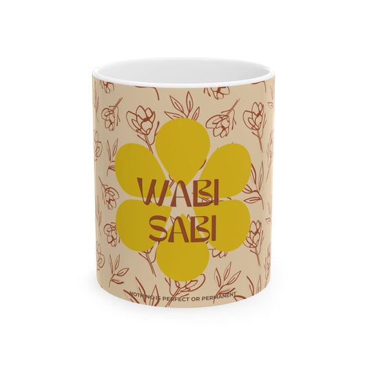 Mug with floral design and 'Wabi Sabi' text on a beige background