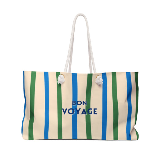 Striped bag with 'Bon Voyage' text on a white background