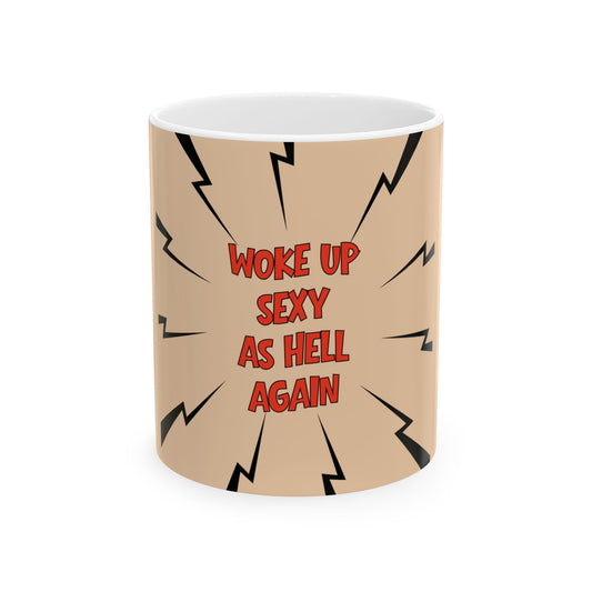 Beige mug with red text 'Woke up sexy as hell again' on a white background