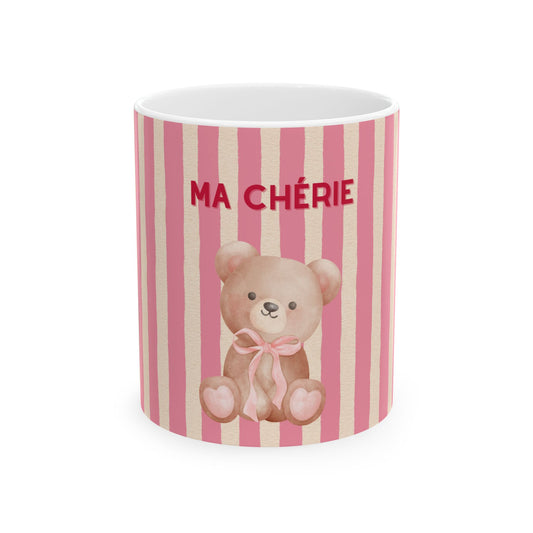 Ceramic mug with teddy bear design and 'MA CHERIE' text on pink and white striped background