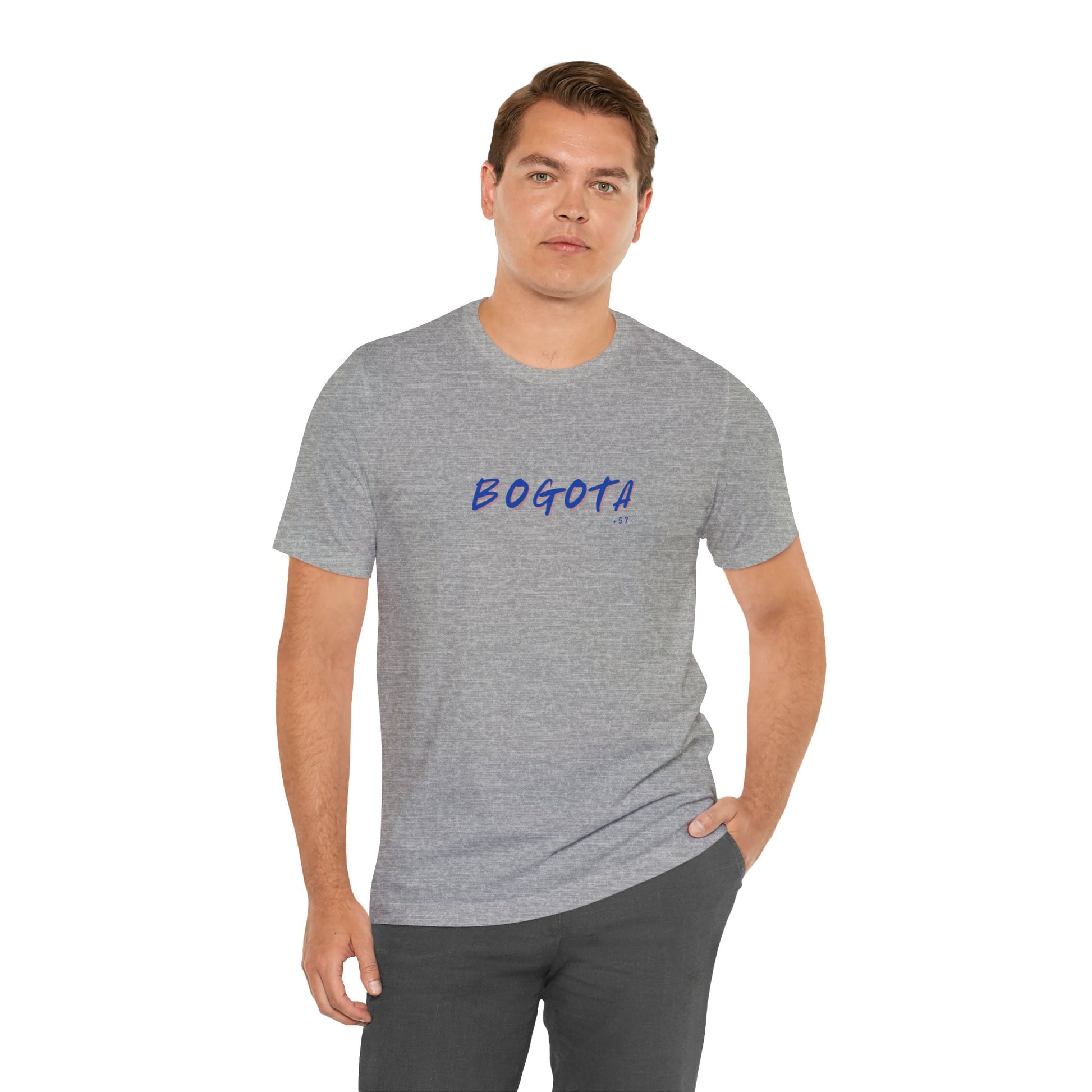 Man wearing a gray t-shirt with 'BOGOTA' printed in blue on a white background