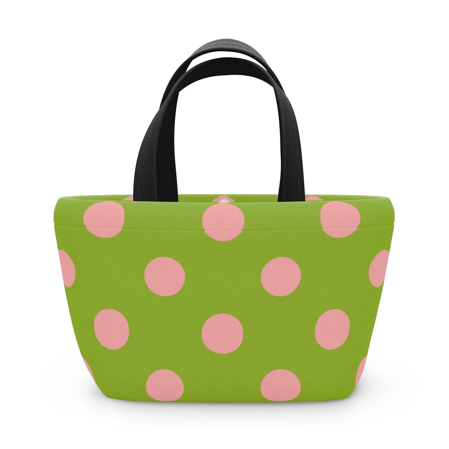 Green tote bag with pink polka dots on a white background