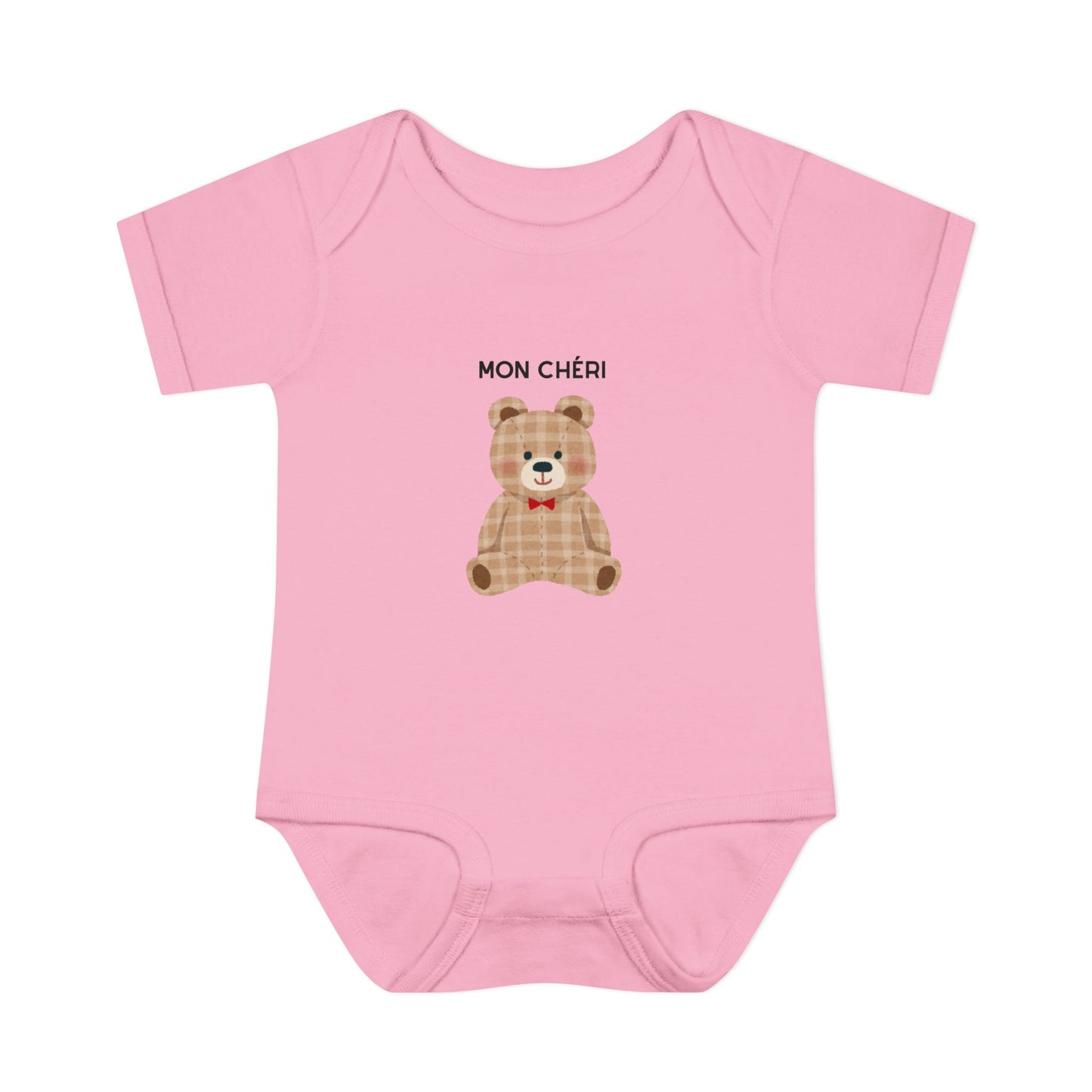 Pink baby onesie with a teddy bear and 'MON CHÓRI' text on a white background