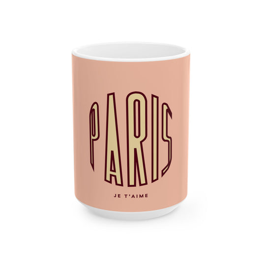 Mug with 'PARIS JE T'AIME' text on a pink background