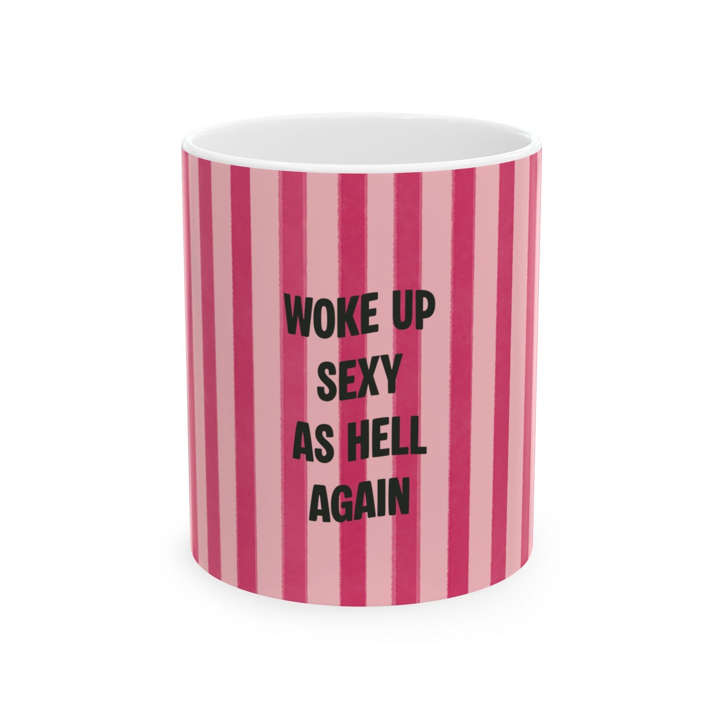 Mug with pink and white striped pattern and text 'Woke up sexy as hell again' on a white background