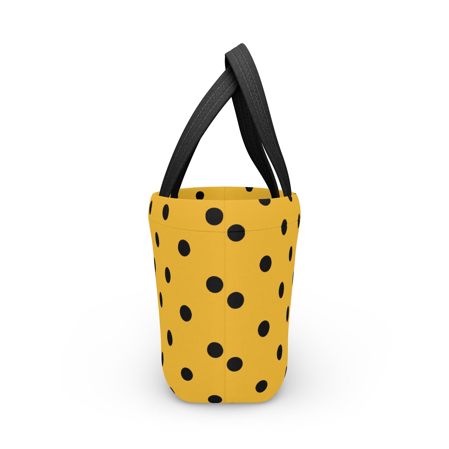 Yellow bucket with black polka dots and black handles on a white background