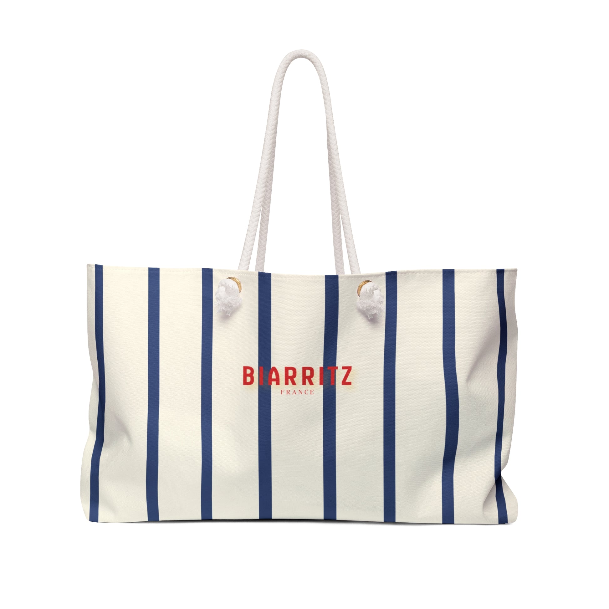 Striped tote bag with 'BIARRITZ FRANCE' text on a white background