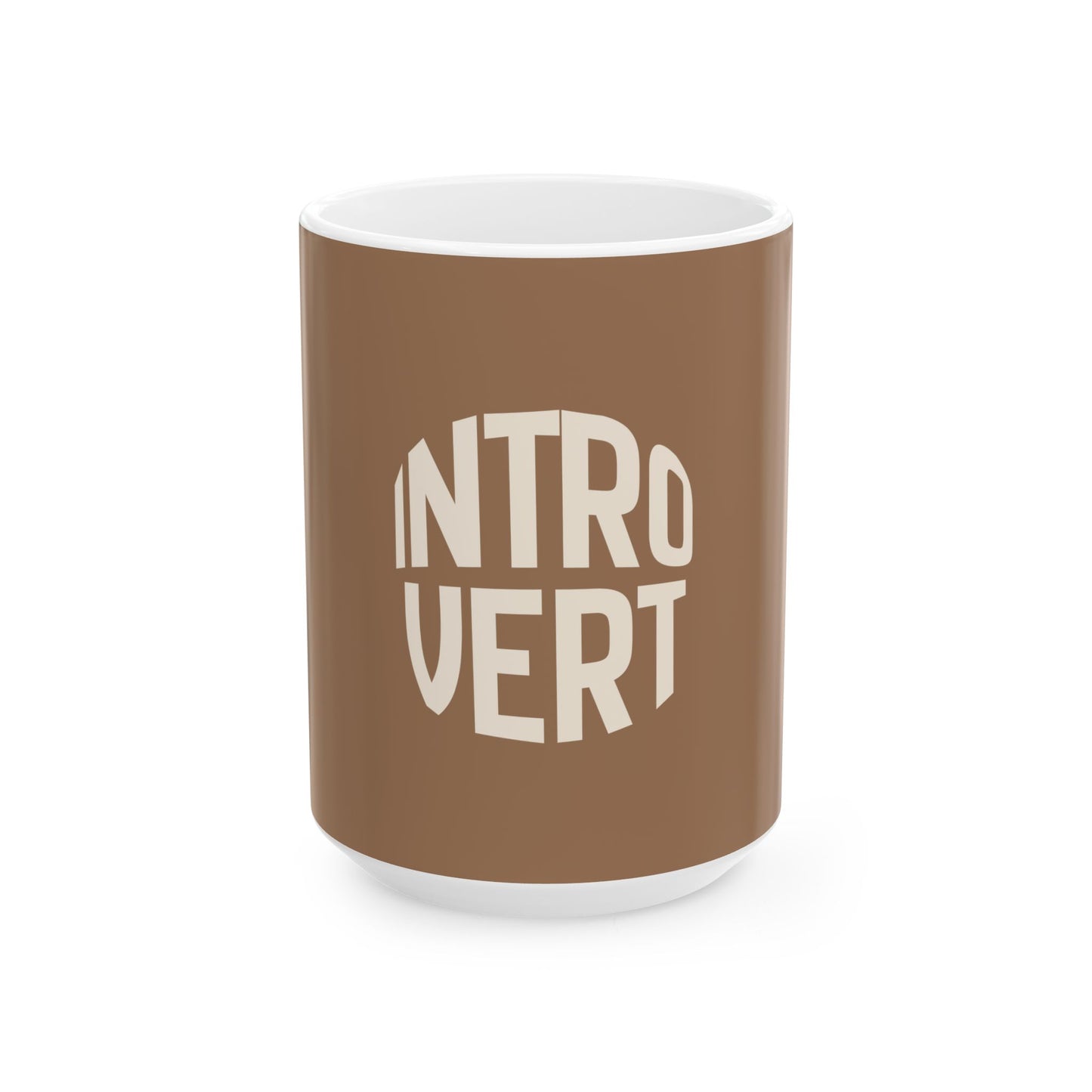 Brown mug with 'INTROVERT' text on a white background