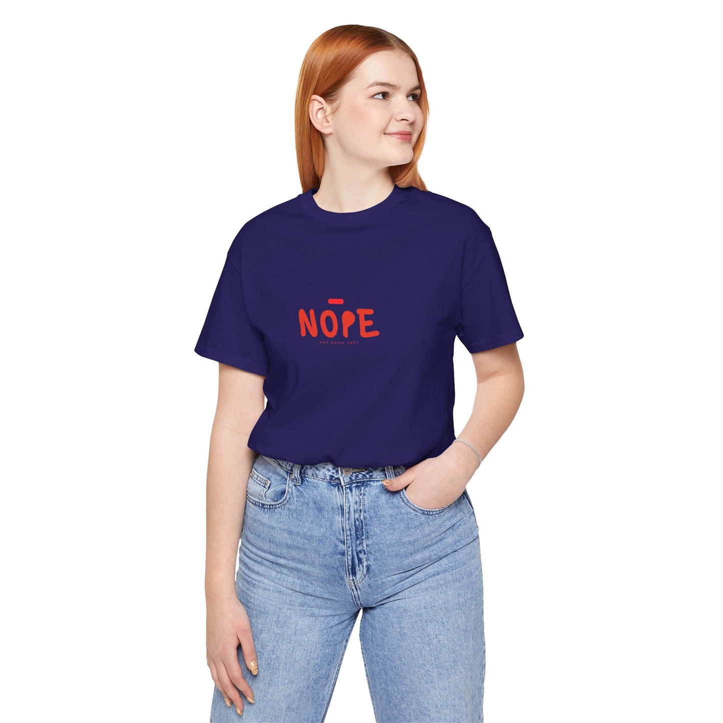 Person wearing a purple t-shirt with 'NOPE' in red text on a white background
