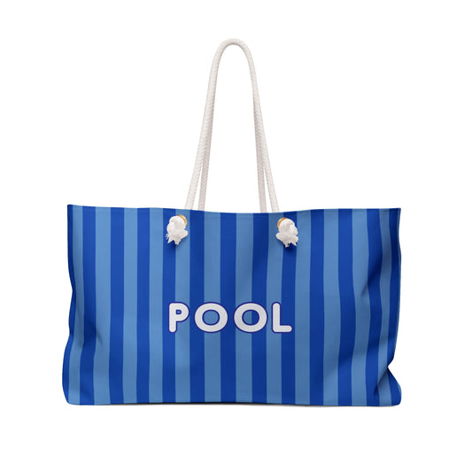 Blue striped beach bag with 'POOL' text on a white background