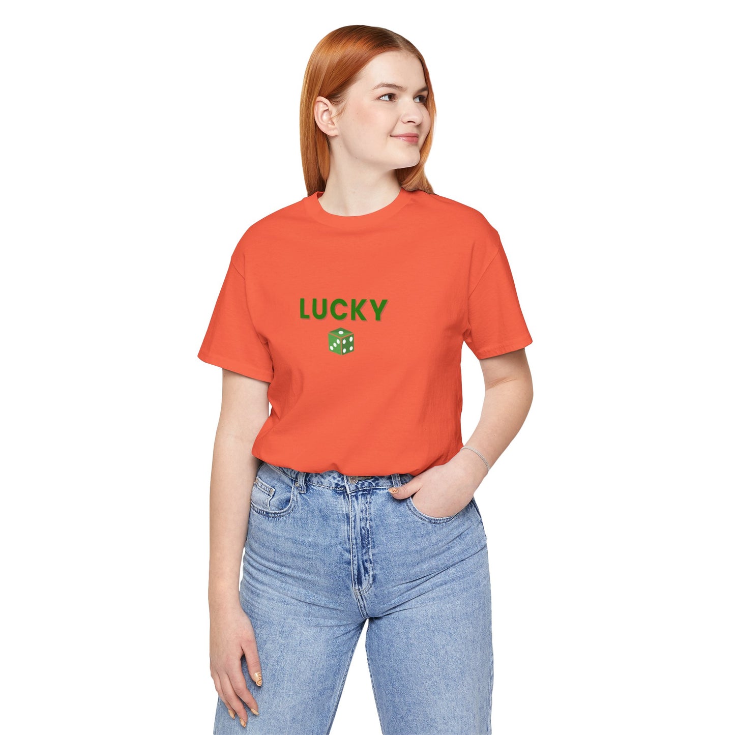 Person wearing an orange t-shirt with 'LUCKY' printed on it against a white background