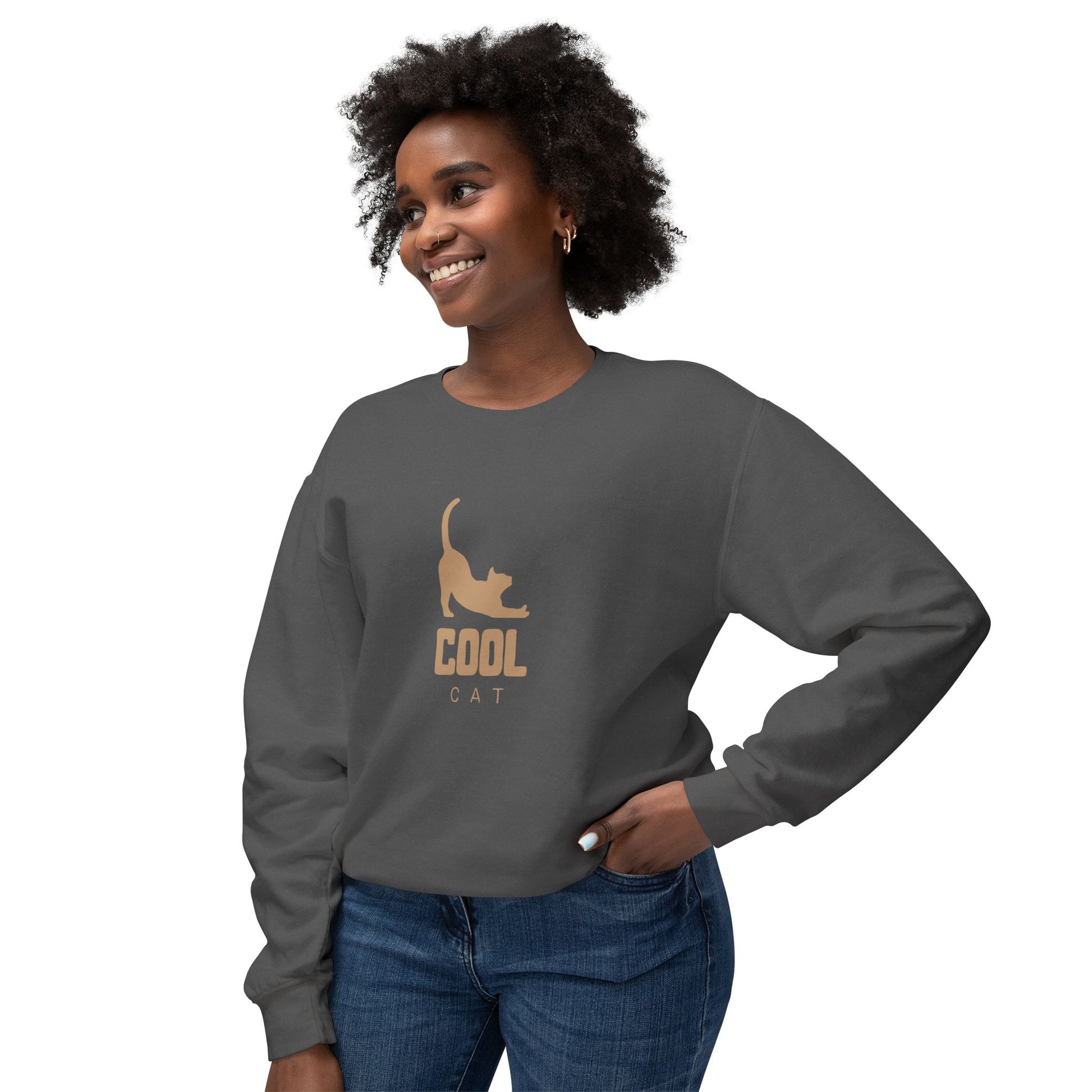 Woman wearing a gray sweatshirt with a cat graphic and 'COOL CAT' text on a white background