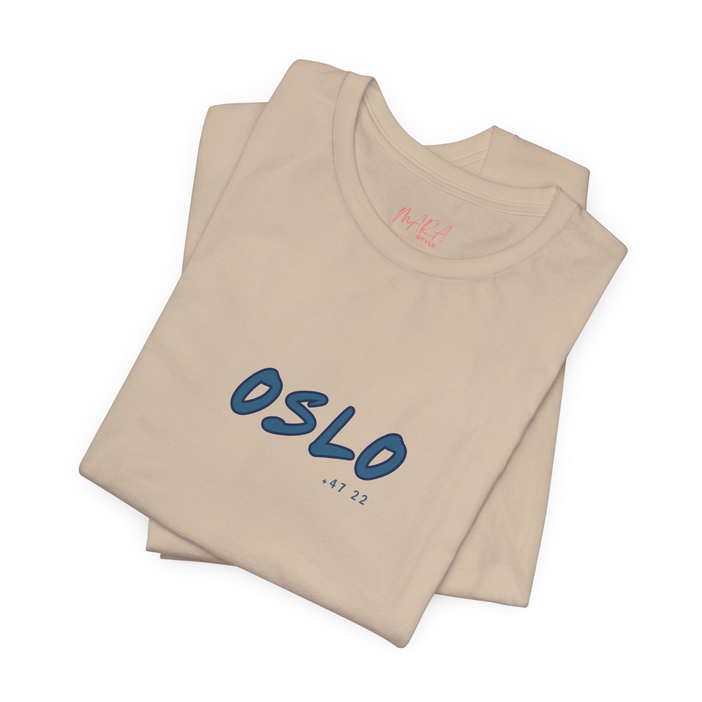 Beige t-shirt with 'OSLO' printed on it, folded and displayed against a white background