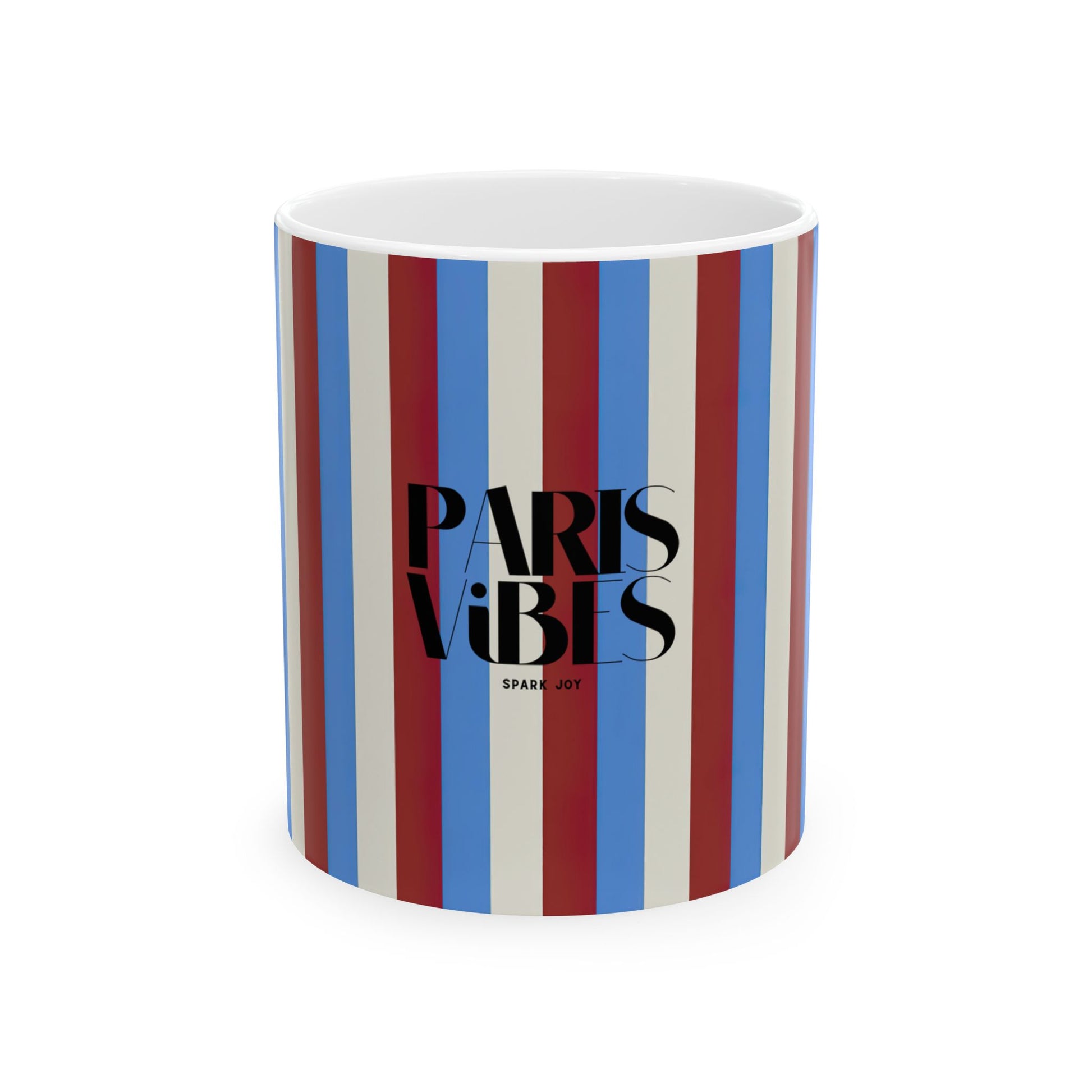 Mug with 'Paris Vibes' text and colorful stripes on a white background